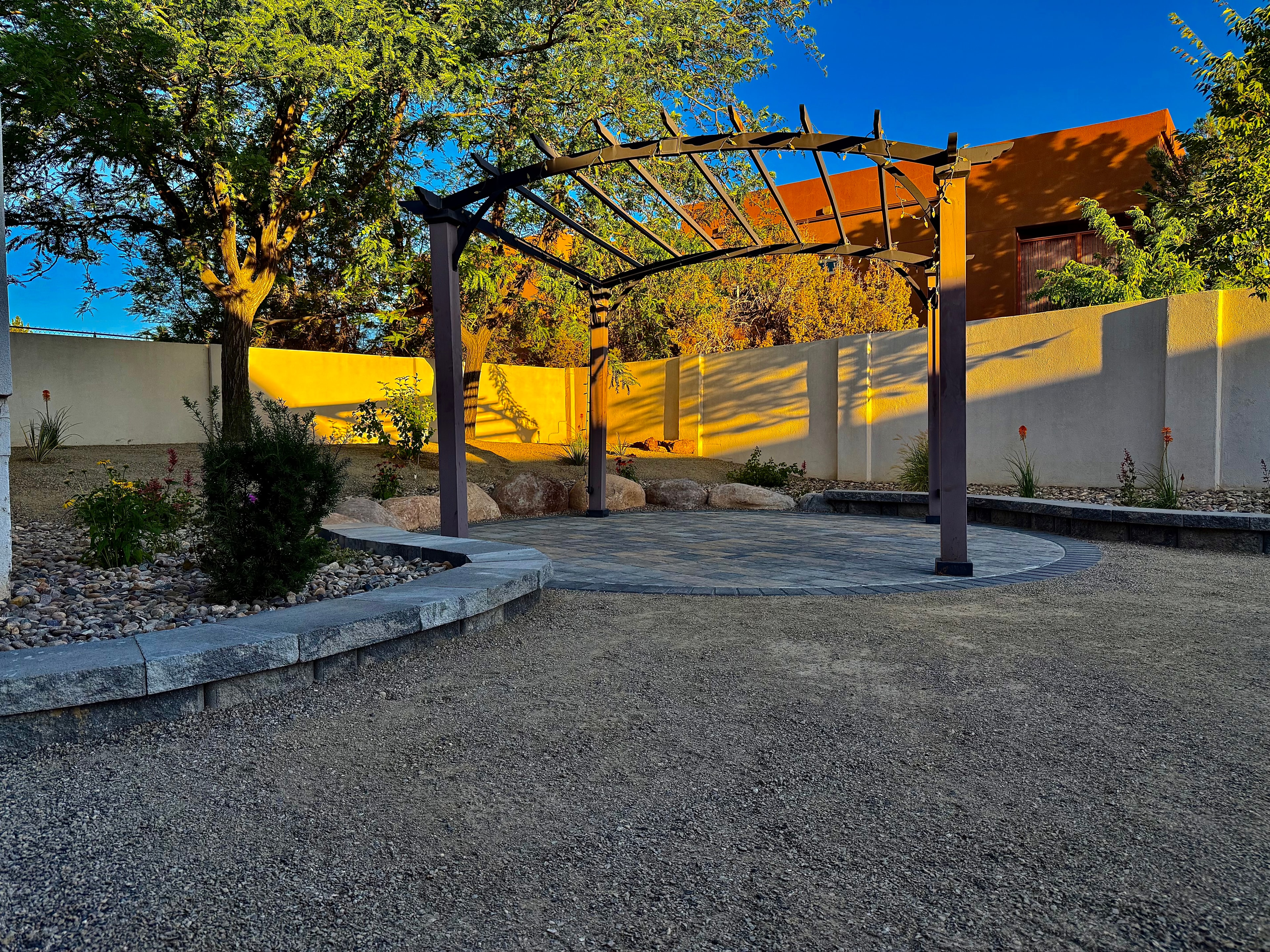 Outdoor pergola and courtyard hardscape design in the Four Corners area by High Desert NativeScapes